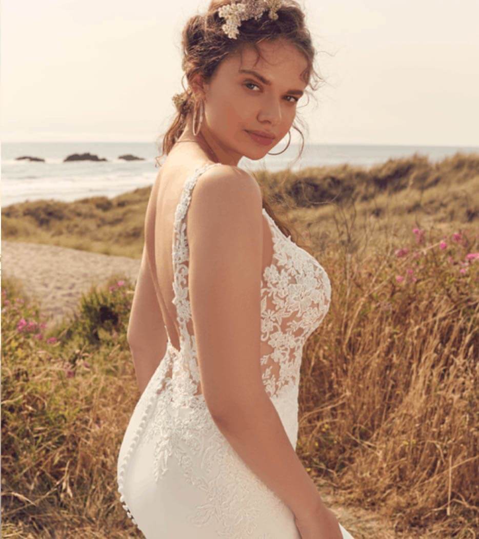 Model wearing a white gown