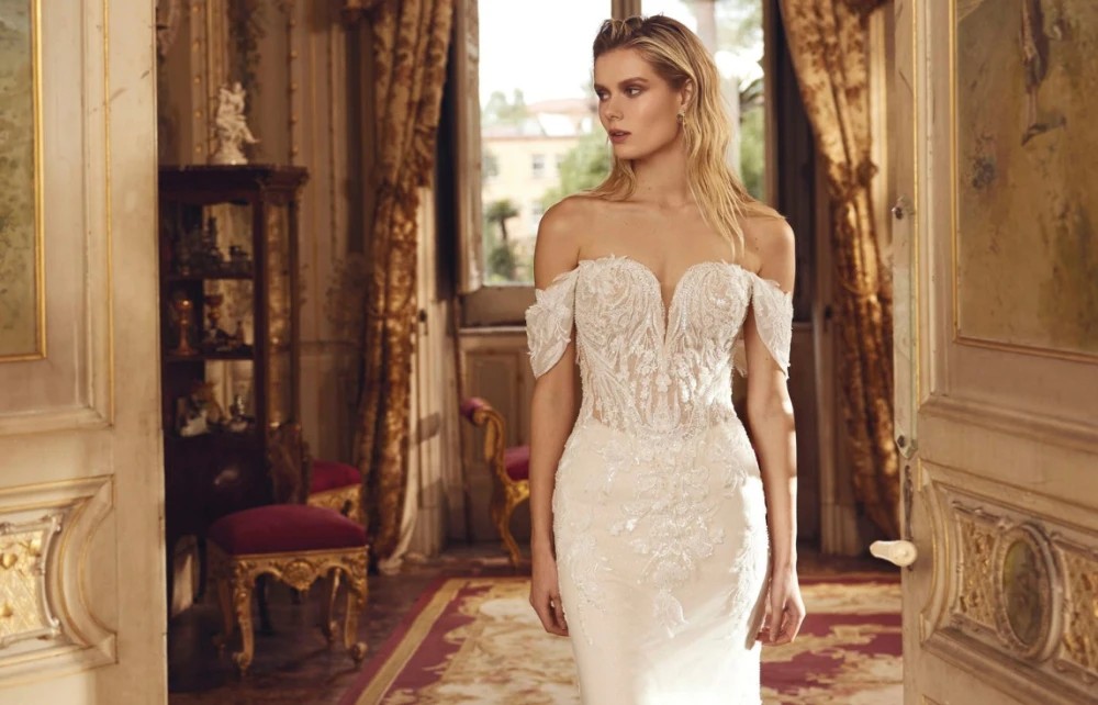 Model wearing a white gown