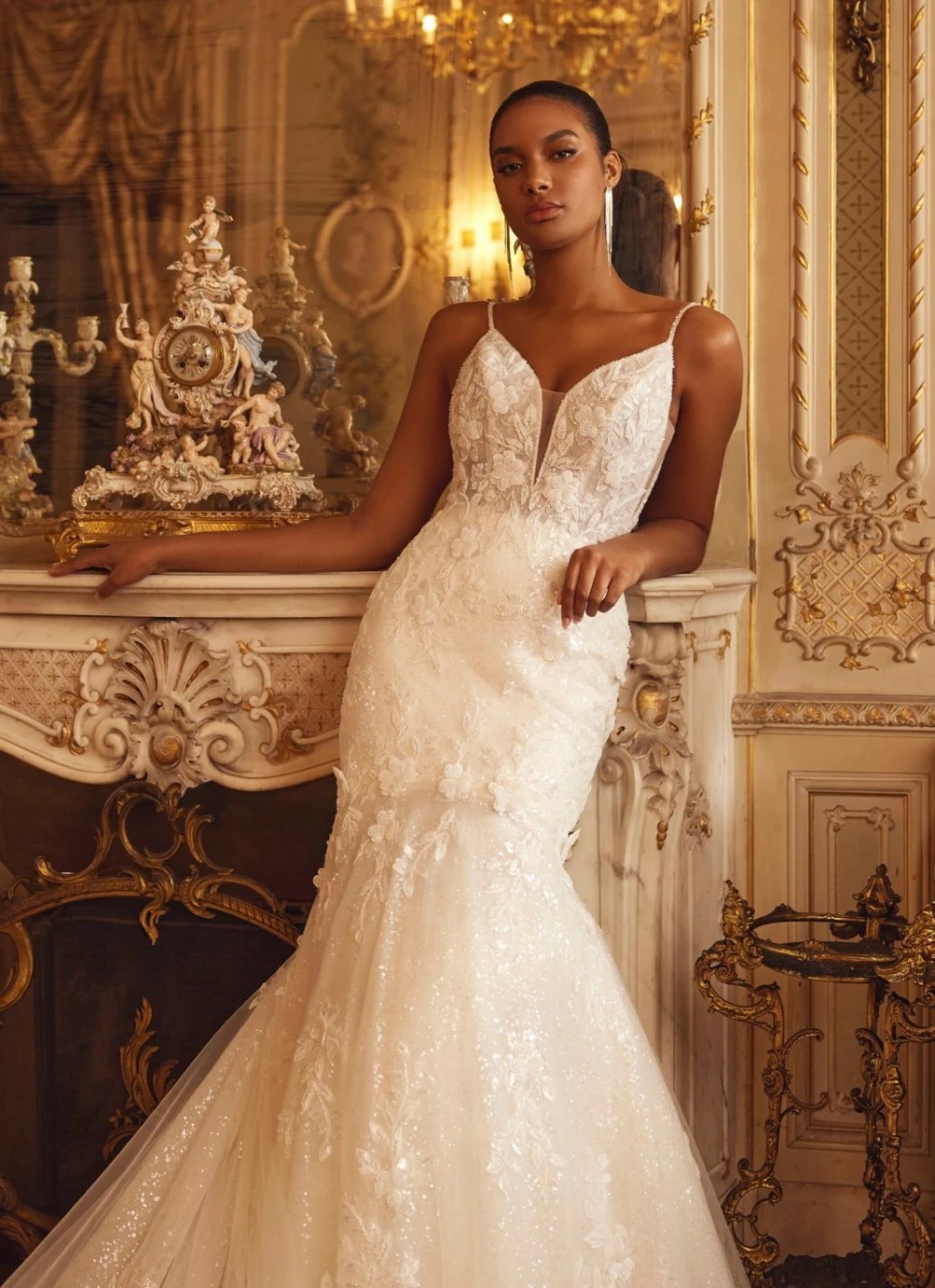 Model wearing a white gown