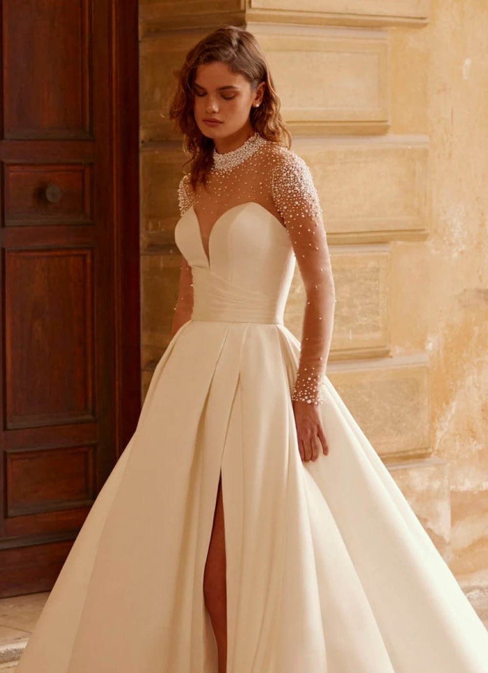 Model wearing a white gown