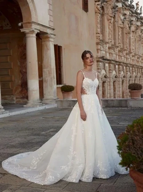 Model wearing a white gown