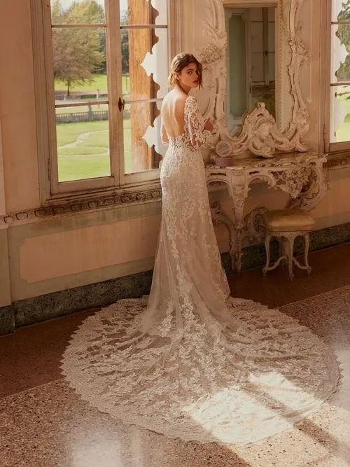 Model wearing a white gown
