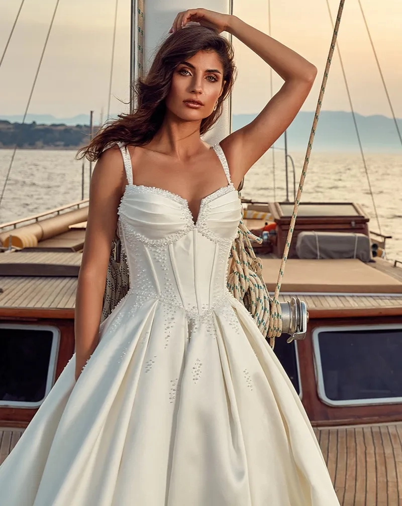 Model wearing a white gown