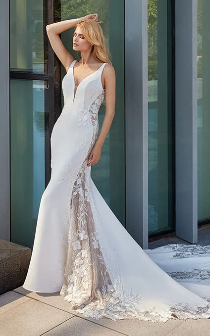 Model wearing a white gown